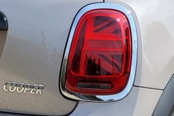 Close-up of a car's rear light featuring a Union Jack design.